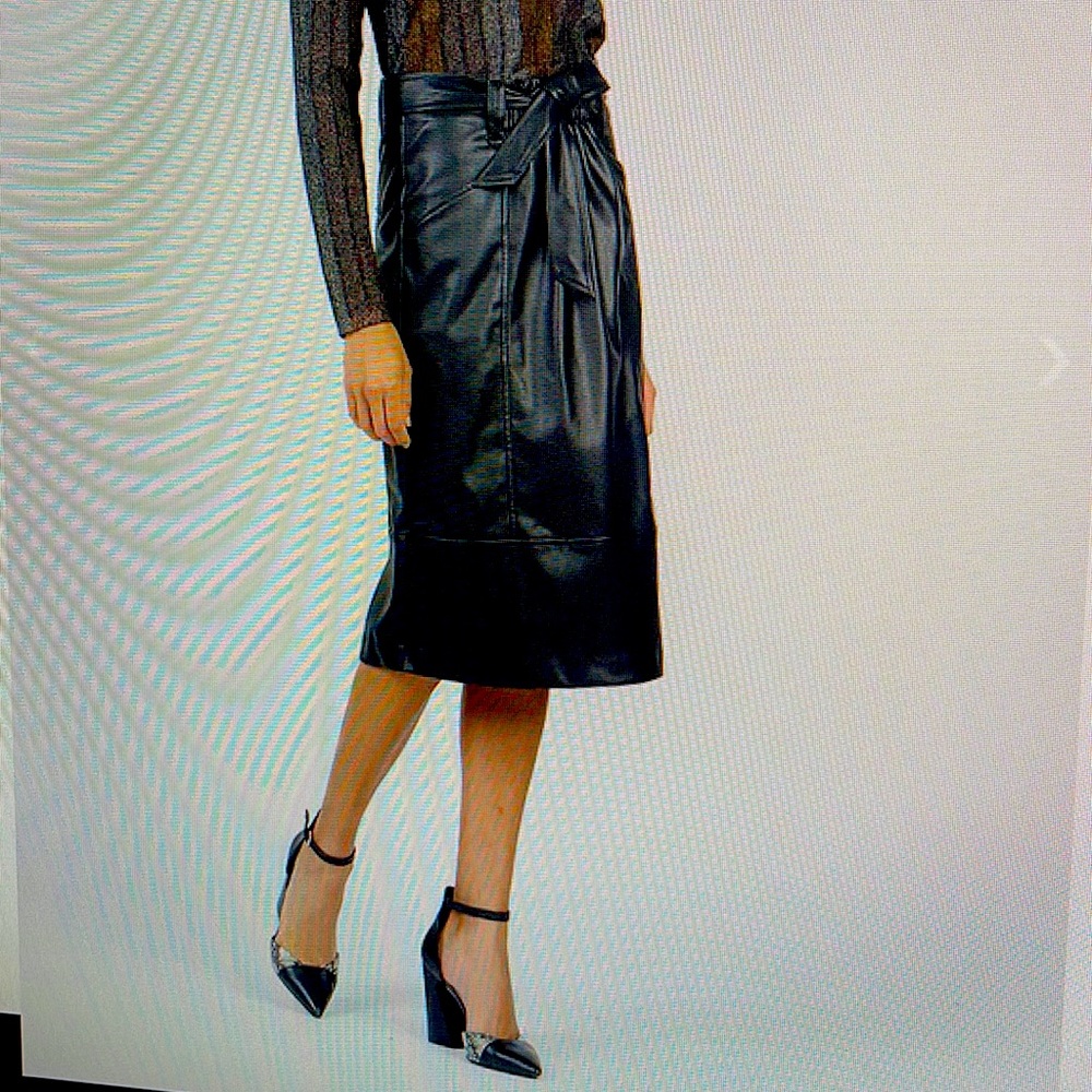 So soft!! Faux leather with suede lining. Gorgeous skirt!